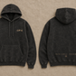 The Glory Be Hoodie in Washed Black, front and back flat lay